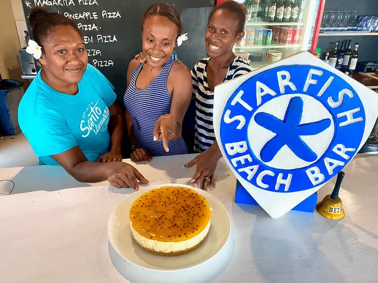 Staff showing a fresh dessert